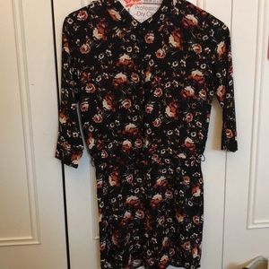 black and floral half sleeve romper